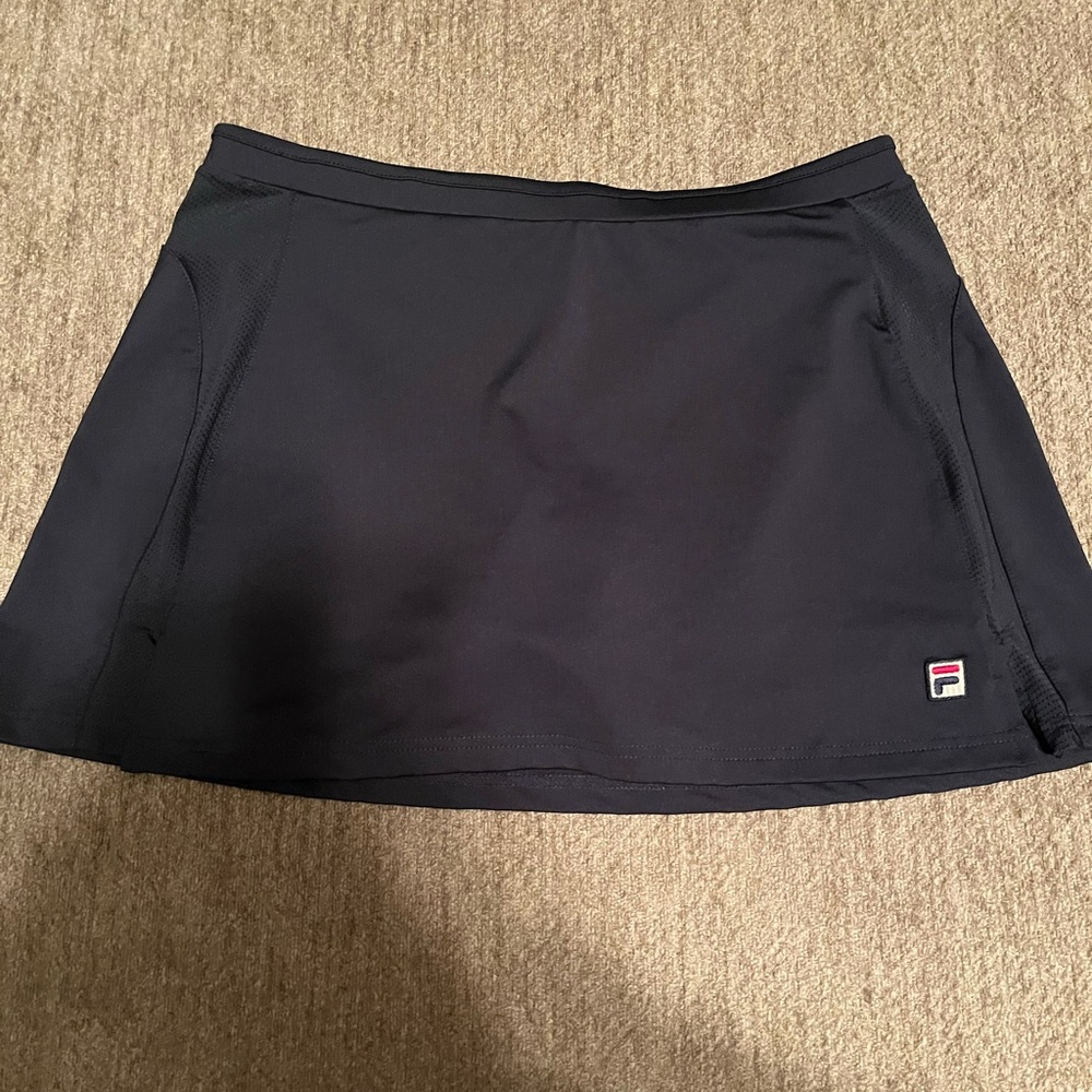 This is a navy skirt that has never been worn